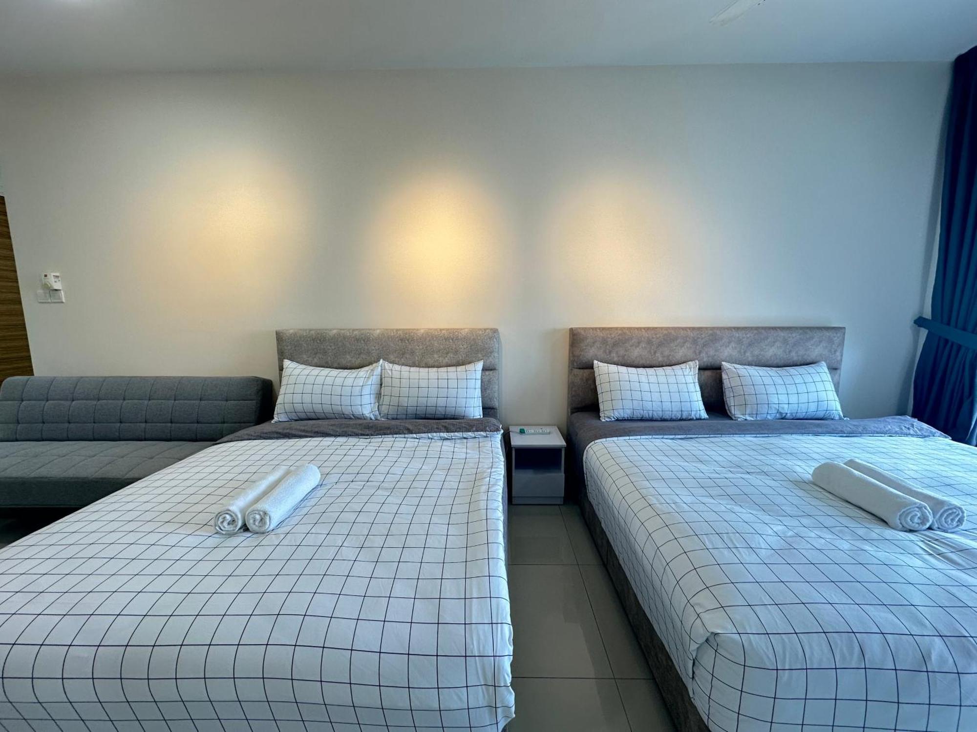 Teega Suites Puteriharbour By Wp Homestay Джохор-Бару Номер фото